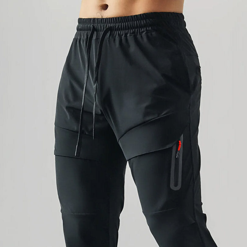 Pantaloni jogger elastici da uomo per tutte le condizioni con design con cerniera 