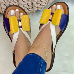 Flache Damen-Sandalen mit Schleife und gemischten Farben 